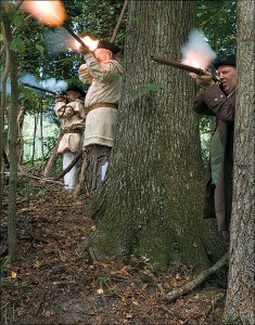 American militia employing muskets in reenactment