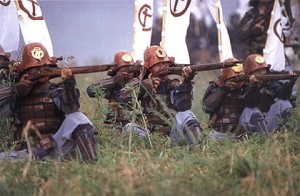 Japanese soldiers employing arquebus in reenactment. 